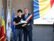 La Râmnicu Vâlcea, de Ziua Imnului Național, primarul Mircia Gutău l-a premiat pe Claudiu Ilie Clenci, elevul care a obținut media 10 la Bacalaureat